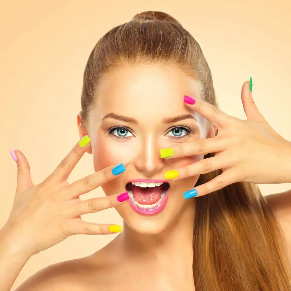 woman with colorful nails