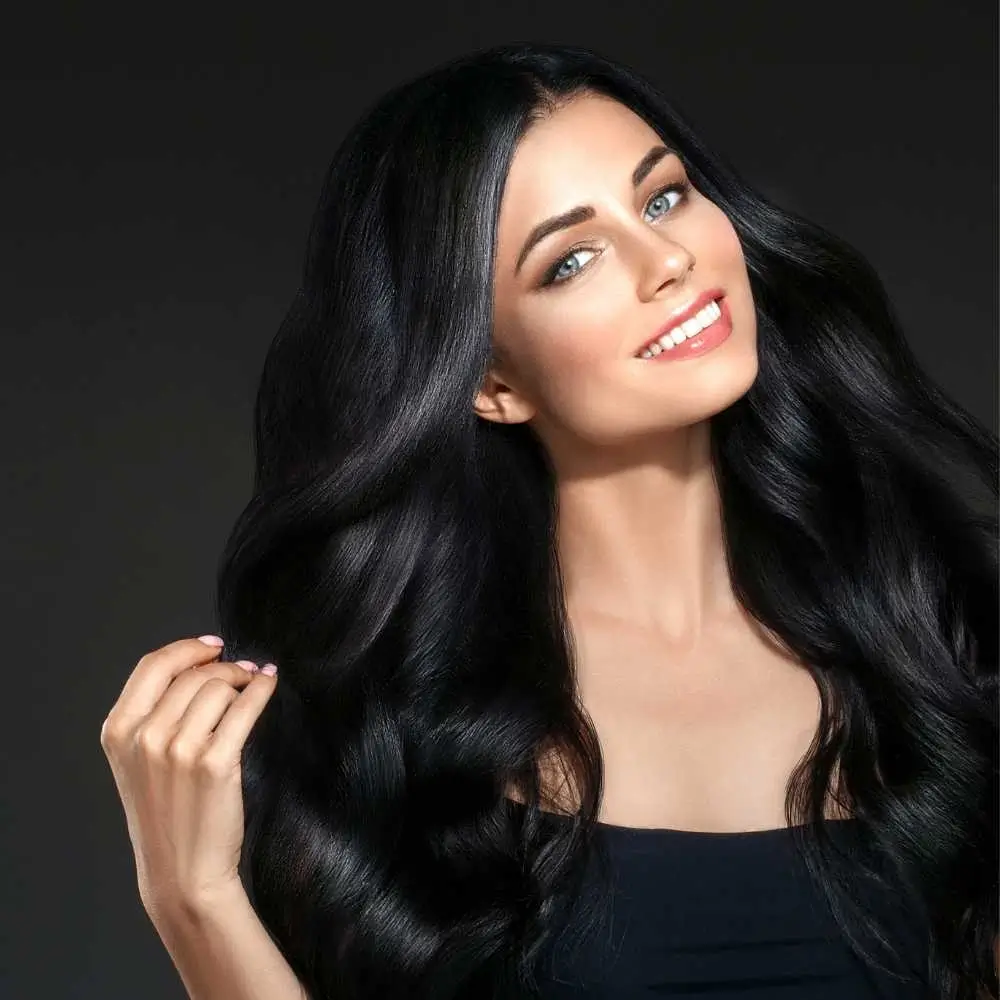 portrait of a gorgeous young woman with wavy black hair