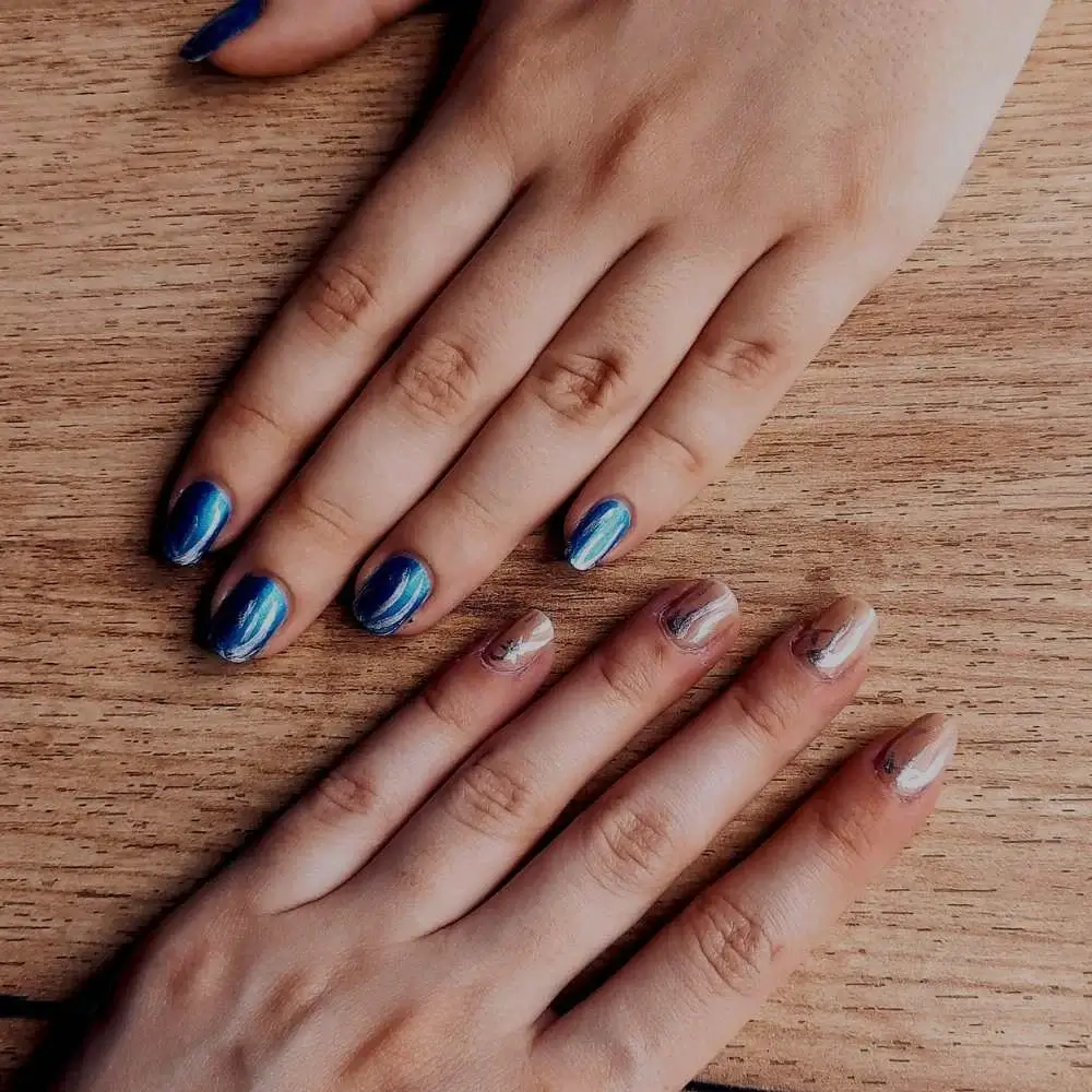 nude and blue nail polish