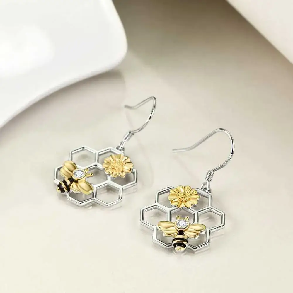 silver honeycomb earrings with gold flower and bee