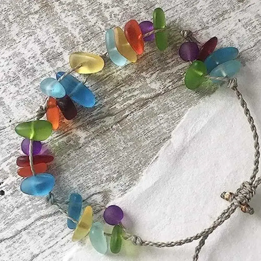 colorful sea glass bracelet on a wooden table