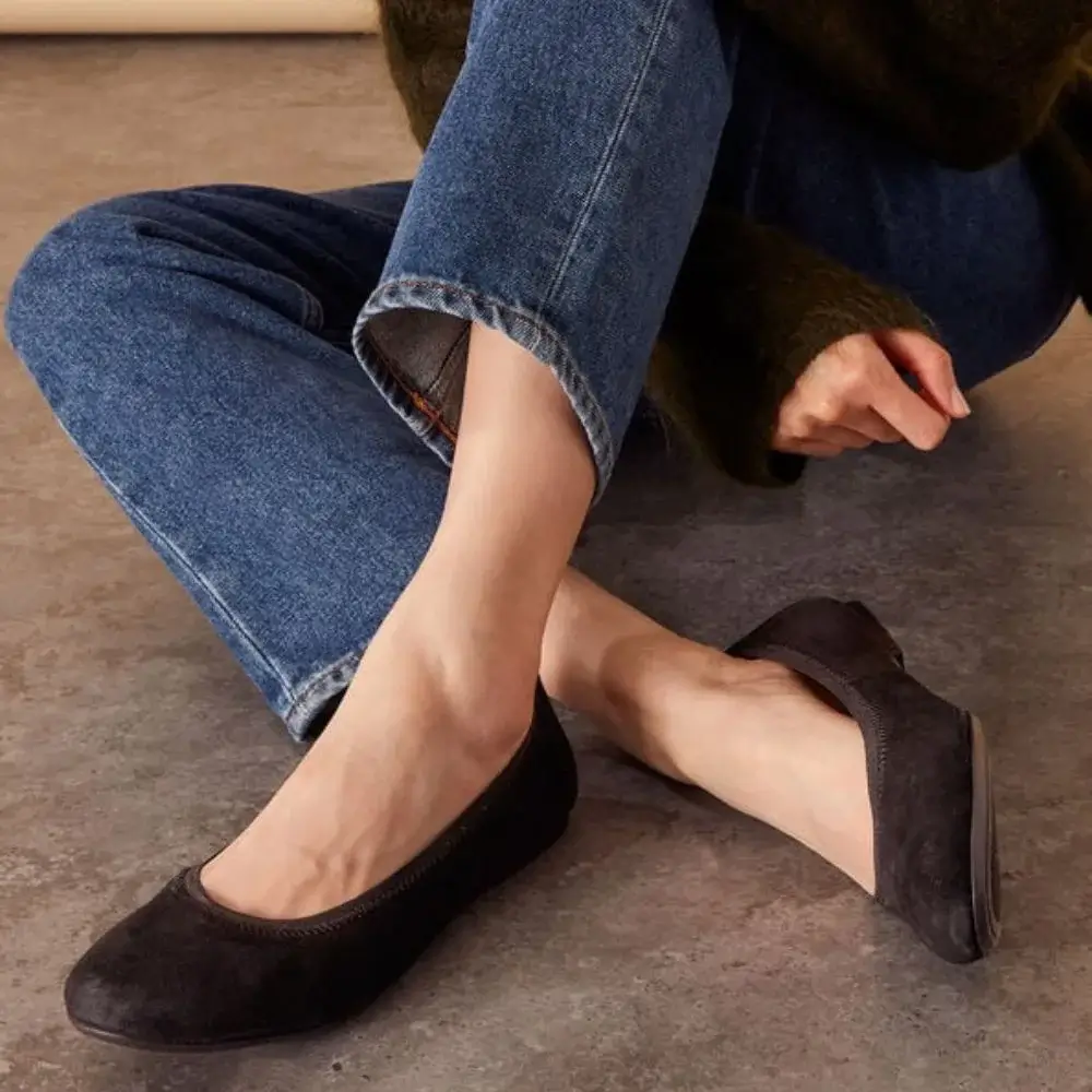 What are the most comfortable materials for black flats?