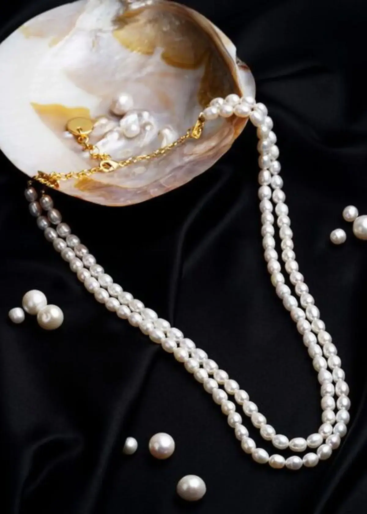 How do I choose the right length for my rice pearl necklace?