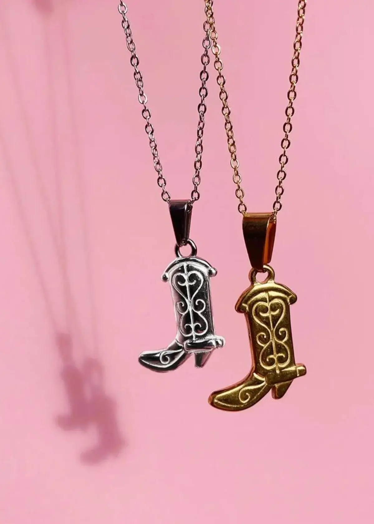 What does a Cowboy Boot Necklace symbolize in a necklace?