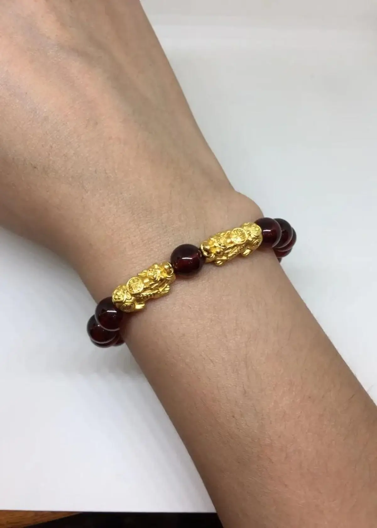 What is a Pixiu bracelet and what does it symbolize?