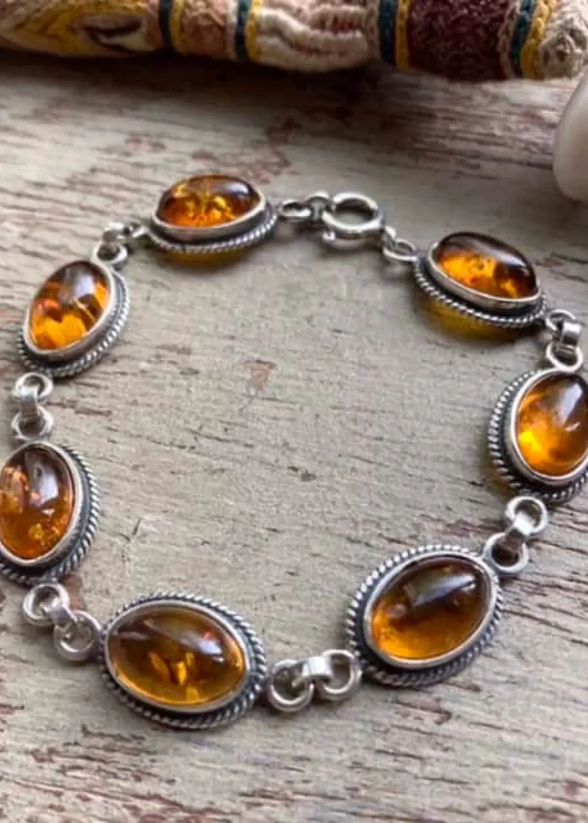 What is the significance of amber bracelets?