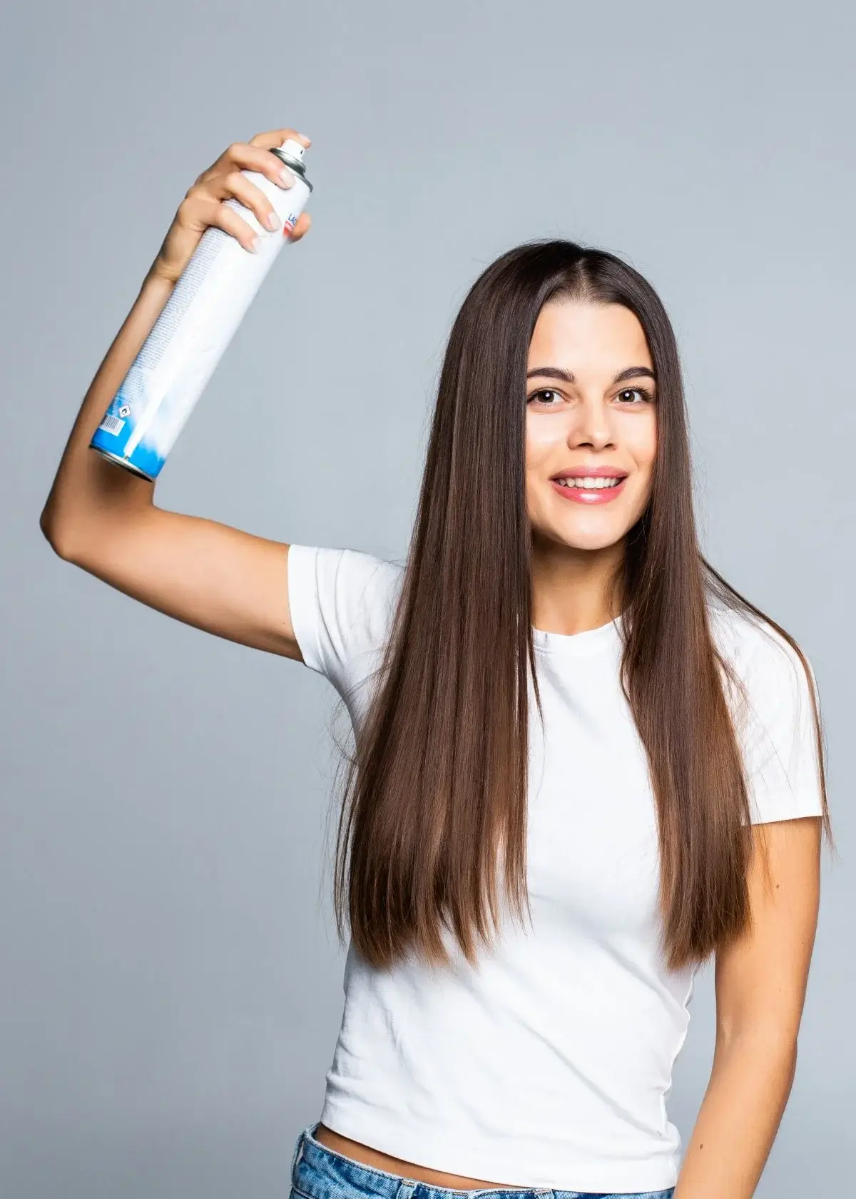 How does a hair straightening spray work?