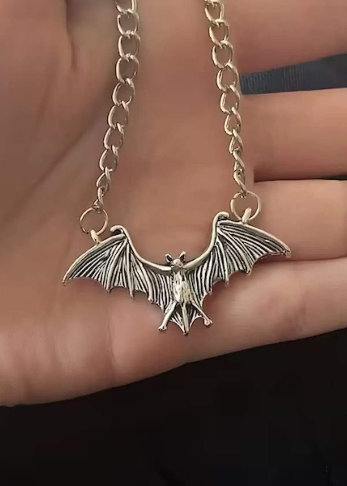 What materials are bat necklaces made of?