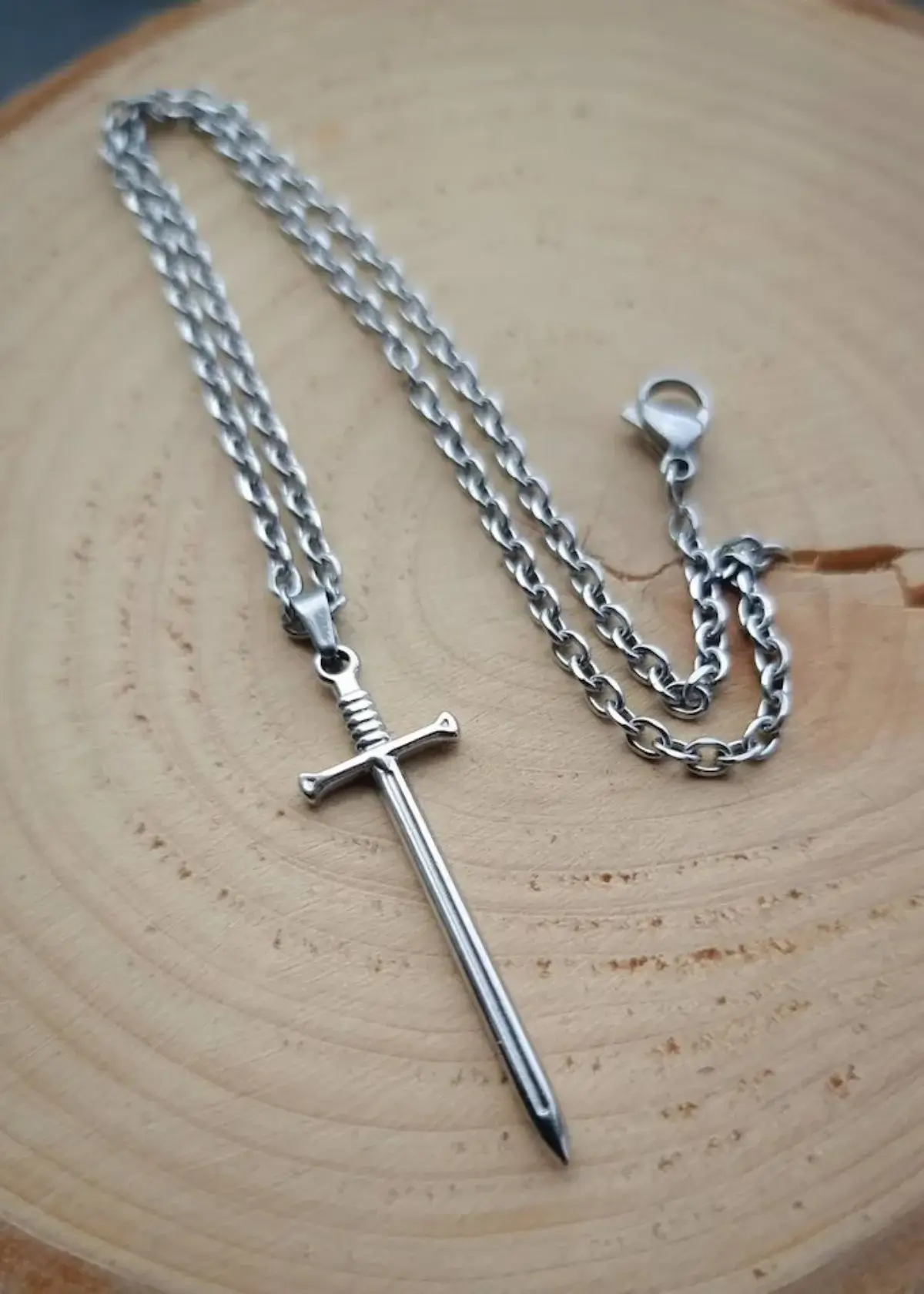 What materials are dagger necklaces made from?