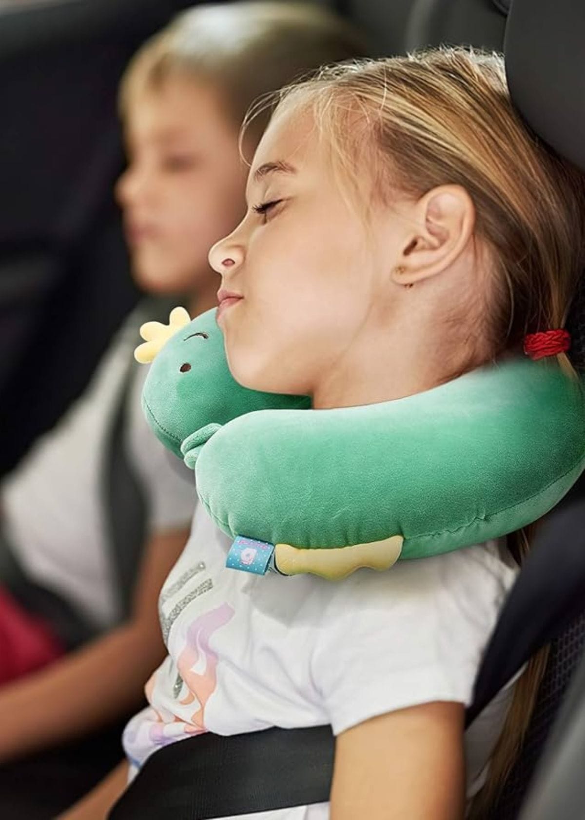 What features make a kids' travel pillow essential?