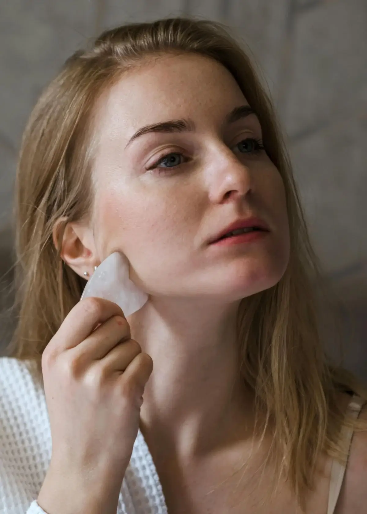 What are the benefits of using a Gua Sha stone?