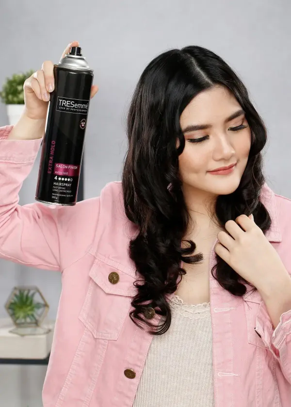 Unlock the Mysteries of Hair Spray: How it Magically Holds Your Curls All Day!